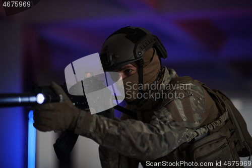 Image of modern warfare soldier in urban environment battlefield