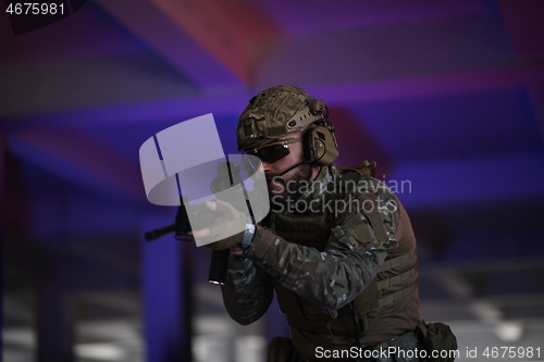 Image of modern warfare soldier in urban environment battlefield