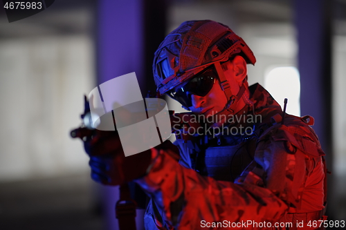 Image of modern warfare soldier in urban environment battlefield