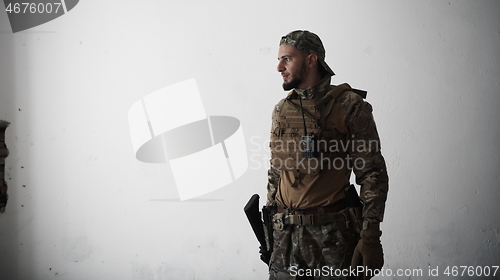 Image of modern warfare soldier portrait in urban environment