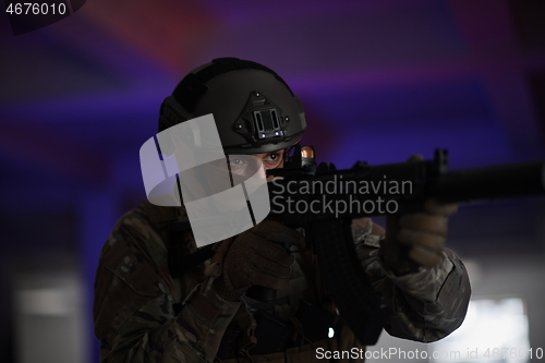 Image of modern warfare soldier in urban environment battlefield