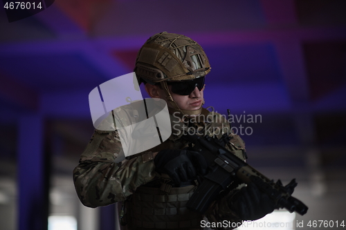 Image of modern warfare soldier in urban environment battlefield