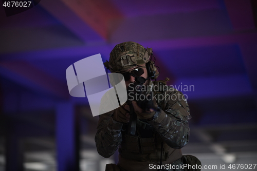 Image of modern warfare soldier in urban environment battlefield