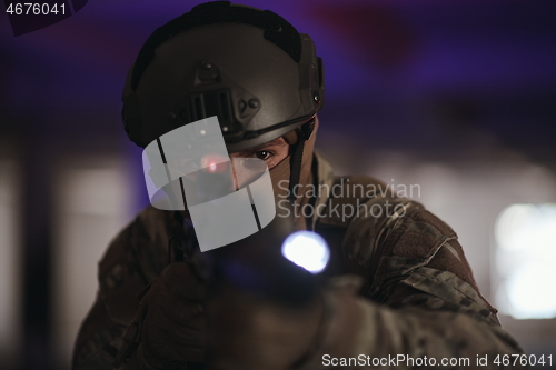 Image of modern warfare soldier in urban environment battlefield