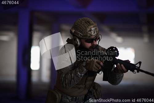 Image of modern warfare soldier in urban environment battlefield