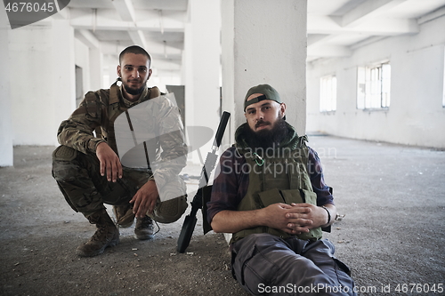 Image of soldier squad team portrait in urban environment