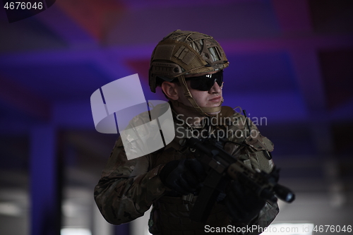 Image of modern warfare soldier in urban environment battlefield