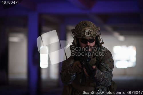 Image of modern warfare soldier in urban environment battlefield