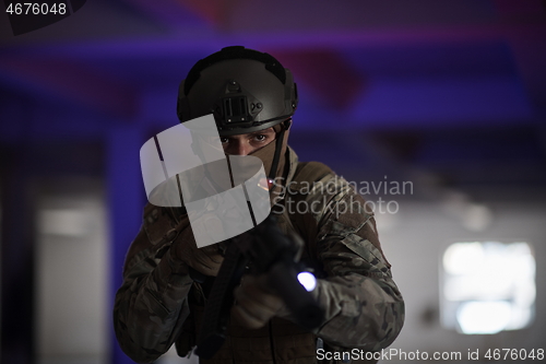 Image of modern warfare soldier in urban environment battlefield