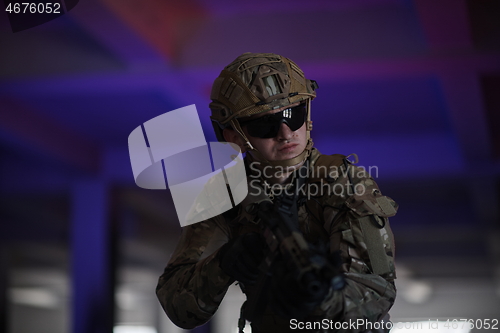 Image of modern warfare soldier in urban environment battlefield