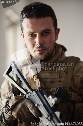 Image of modern warfare soldier portrait in urban environment