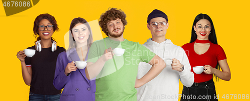 Image of Portrait of young people on bright yellow studio background, collage