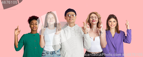 Image of Portrait of young people on pink coral studio background, collage