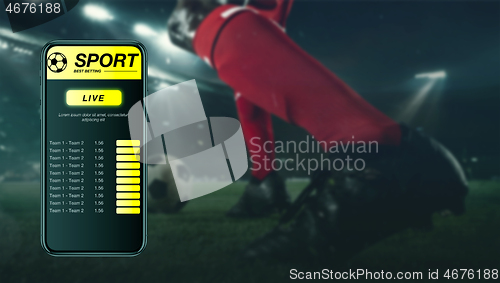 Image of Smartphone screen with mobile app for betting and score, sportsman on background