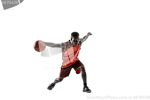 Image of Full length portrait of a basketball player with ball