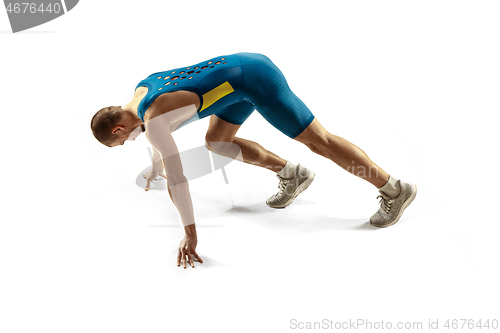 Image of Young caucasian man running or jogging isolated on white studio background.