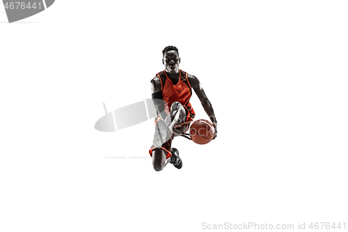 Image of Full length portrait of a basketball player with ball