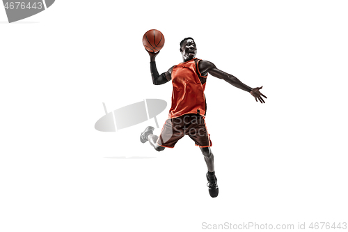 Image of Full length portrait of a basketball player with ball