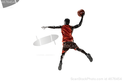 Image of Full length portrait of a basketball player with ball