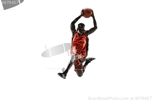 Image of Full length portrait of a basketball player with ball