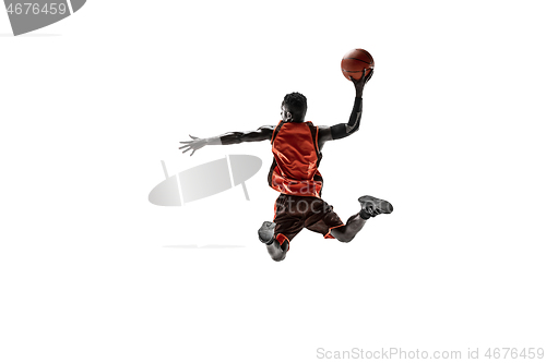 Image of Full length portrait of a basketball player with ball