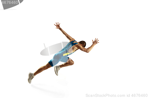 Image of Young caucasian man running or jogging isolated on white studio background.