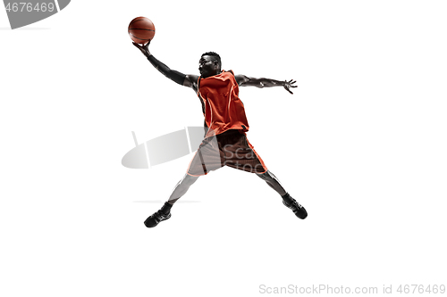 Image of Full length portrait of a basketball player with ball