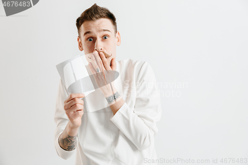 Image of Young man with a surprised expression won a bet