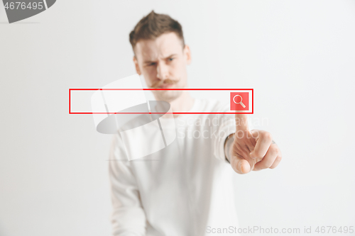 Image of Businessman hand touching empty virtual screen