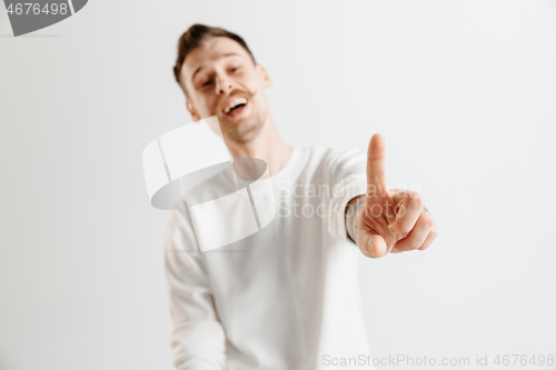 Image of Businessman hand touching empty virtual screen