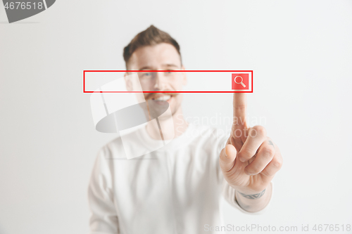 Image of Businessman hand touching empty virtual screen