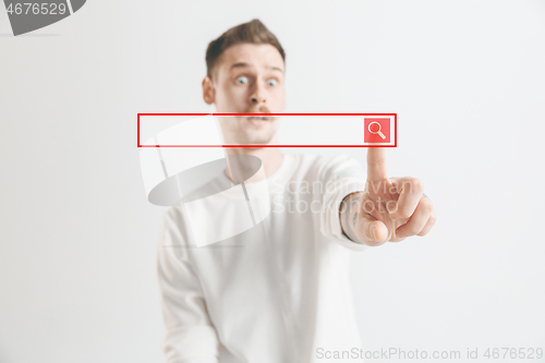 Image of Businessman hand touching empty virtual screen