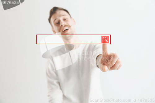 Image of Businessman hand touching empty virtual screen