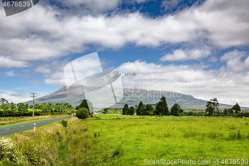 Image of volcano Taranaki covered in clouds, New Zealand 