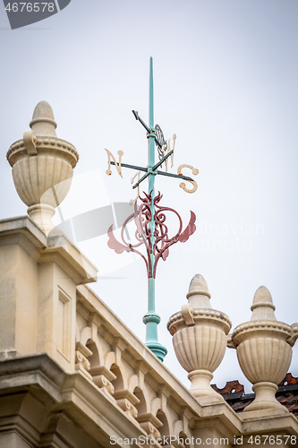 Image of typical wind rose on an old building