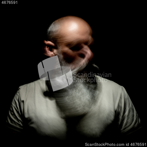 Image of bearded man motion blur portrait