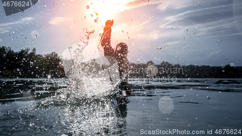 Image of water battle at the sunset lake