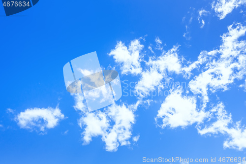 Image of blue sky with hugh white cloud background