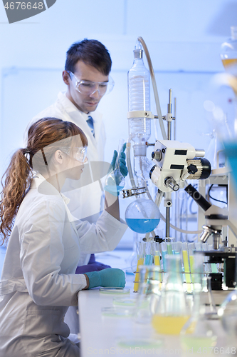 Image of Young chemists researching in life science laboratory.