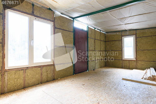 Image of Fragment of the wall of the interior of a country house, the wall is thermally insulated with mineral plates