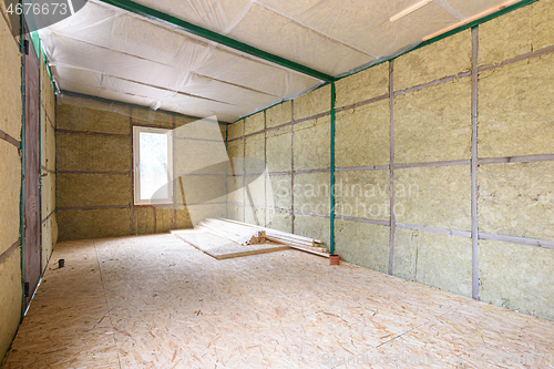 Image of Construction of a small country house, frame insulated with mineral wool