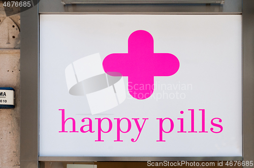 Image of BARCELONA, SPAIN - JUNE 2, 2013: Signboard of candy store Happy Pills in Barcelona