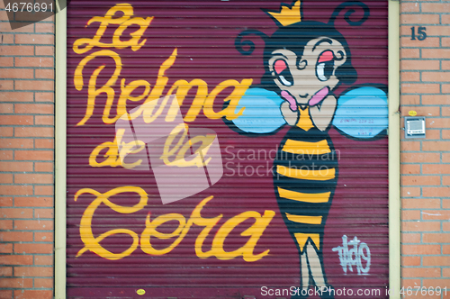Image of BARCELONA, SPAIN - JUNE 2, 2013: Cute cartoon bee painted on the door