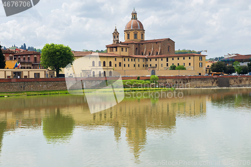 Image of FLORNCE, ITALY - APRIL 24, 2019: View of the historic buildings in Florence. Reflection in the river