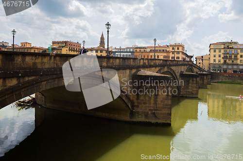 Image of FLORNCE, ITALY - APRIL 24, 2019: View of the historic buildings in Florence. Reflection in the river