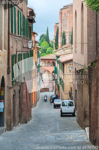 Image of SIENA, ITALY - MAY 19, 2017: Walkway on in old town in Europe