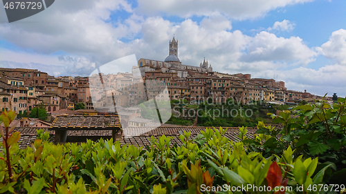 Image of SIENA, ITALY - APRIL 26, 2019: View to the old town in Siena