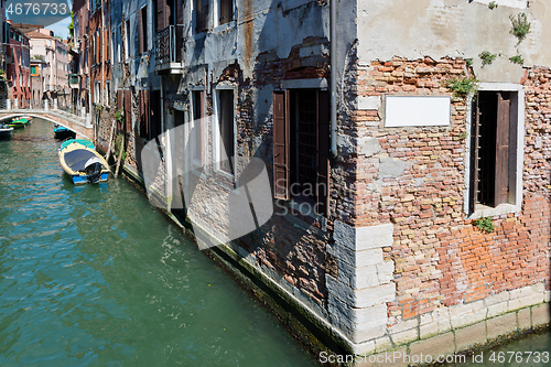 Image of VENICE, ITALY - AUGUST 14, 2016: Typical canals with old houses