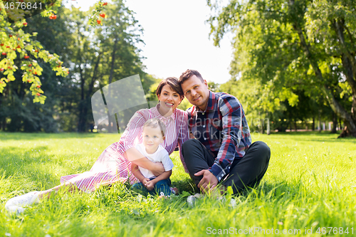 Image of happy family at summer park