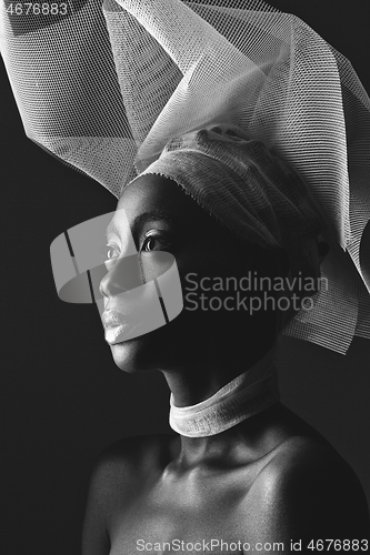 Image of Beautiful african girl with veil hat